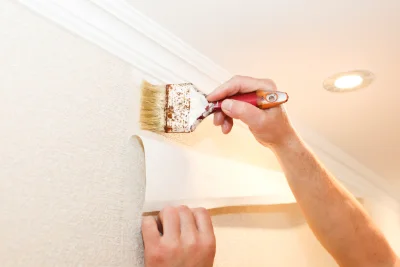 Pose de papier peint à Gignat — revêtements muraux et toiles de verre